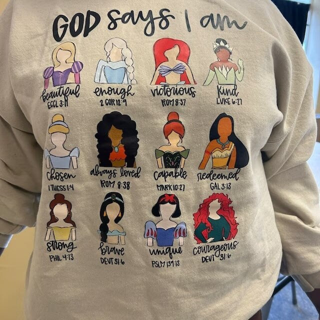 a person wearing a sweatshirt with a bunch of cartoon characters on it