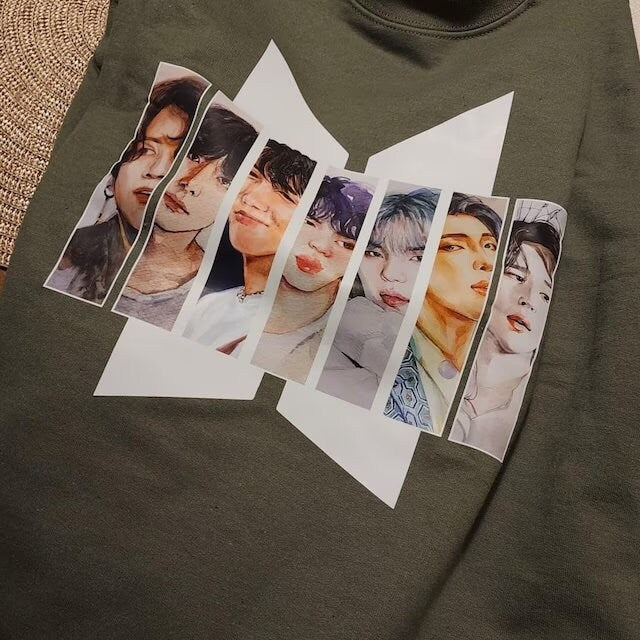 a shirt with a bunch of photos on it