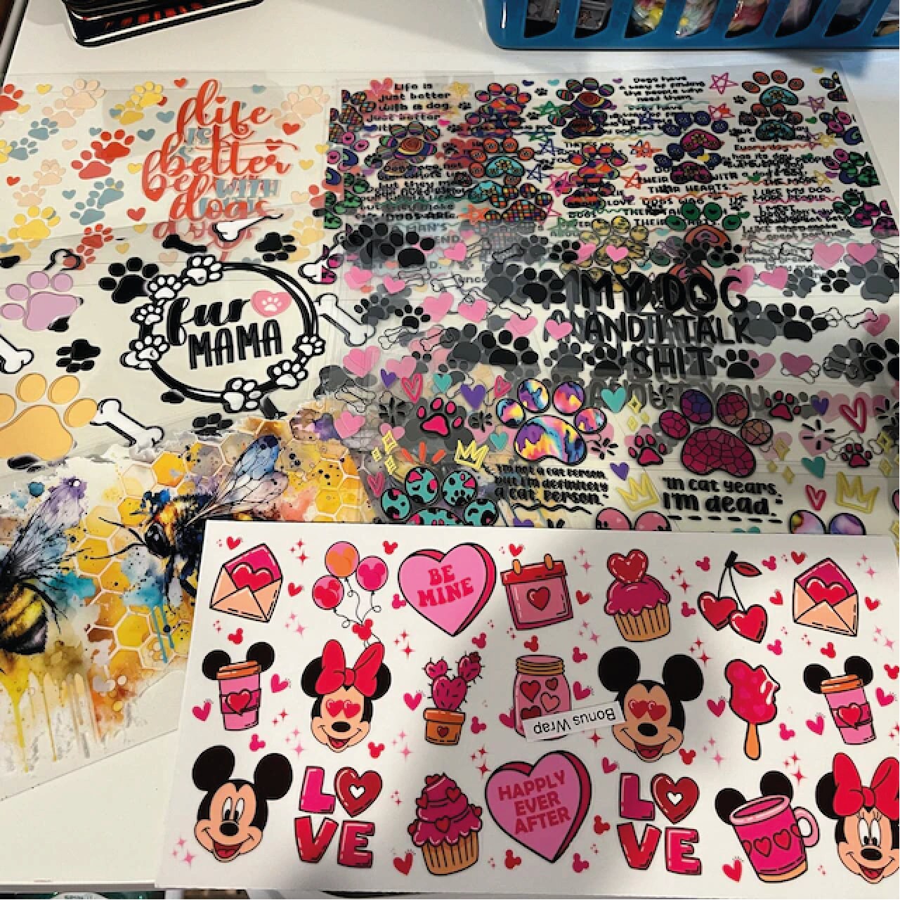 a table topped with lots of different types of stickers